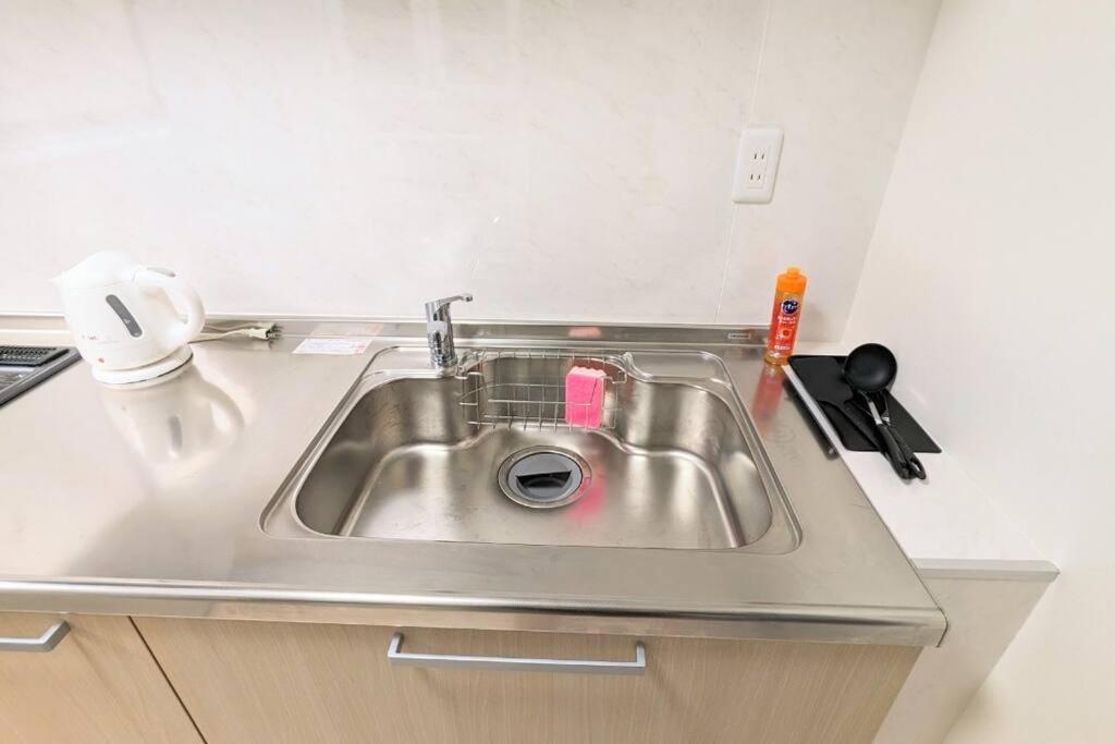 Apartment Jr西九条徒歩4分！最大12名宿泊可能！貸切一軒家！usj、梅田アクセス良好！１f広々リビングあり！