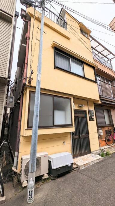 Apartment Jr西九条徒歩4分！最大12名宿泊可能！貸切一軒家！usj、梅田アクセス良好！１f広々リビングあり！